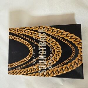 Urban Decay eyeshadow Palette with Black and Gold Design